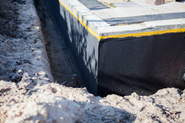 Professional Waterproofing technician working in Morning View, KY